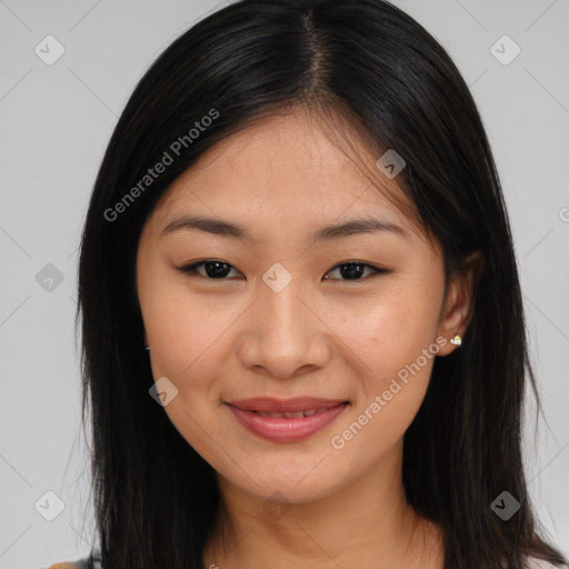 Joyful asian young-adult female with long  brown hair and brown eyes