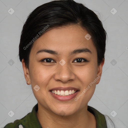 Joyful asian young-adult female with medium  brown hair and brown eyes