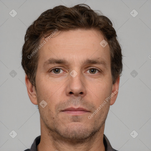 Neutral white adult male with short  brown hair and brown eyes