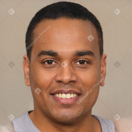 Joyful latino young-adult male with short  black hair and brown eyes