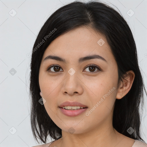 Joyful asian young-adult female with medium  black hair and brown eyes