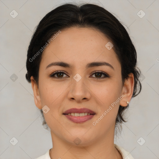 Joyful asian young-adult female with short  brown hair and brown eyes