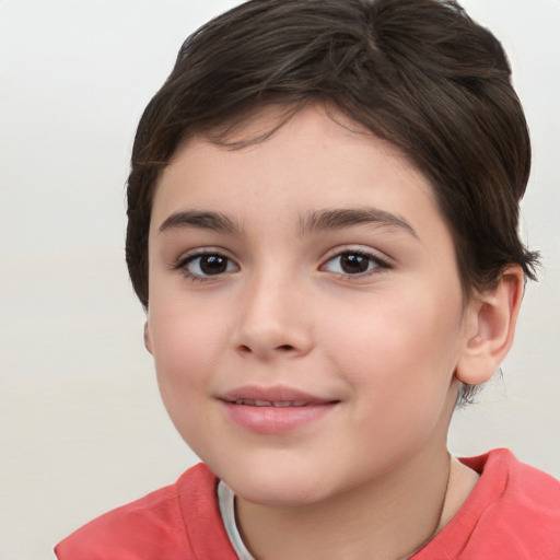 Joyful white child female with short  brown hair and brown eyes