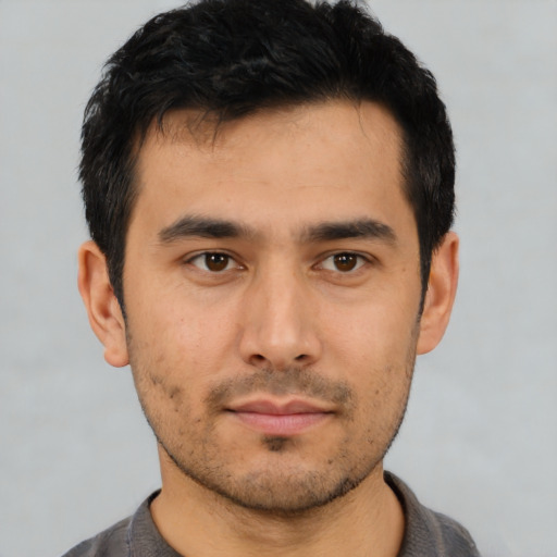 Neutral asian young-adult male with short  black hair and brown eyes