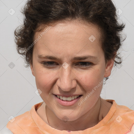 Joyful white adult female with short  brown hair and brown eyes