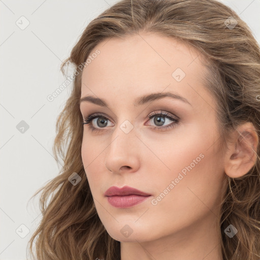 Neutral white young-adult female with long  brown hair and blue eyes