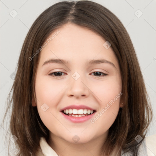 Joyful white child female with medium  brown hair and brown eyes