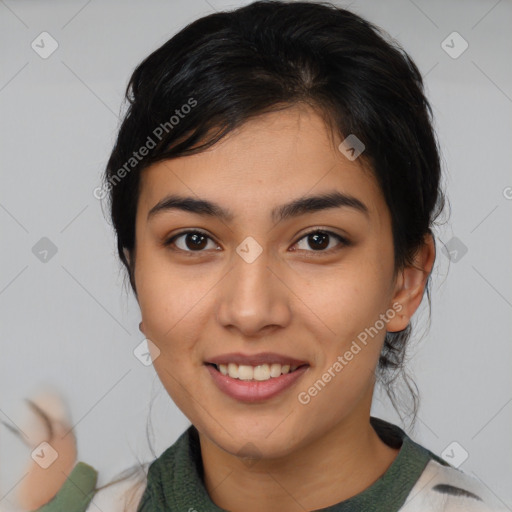 Joyful asian young-adult female with medium  black hair and brown eyes