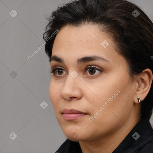 Neutral white young-adult female with long  brown hair and brown eyes