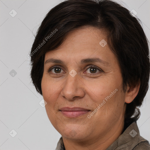 Joyful white adult female with medium  brown hair and brown eyes