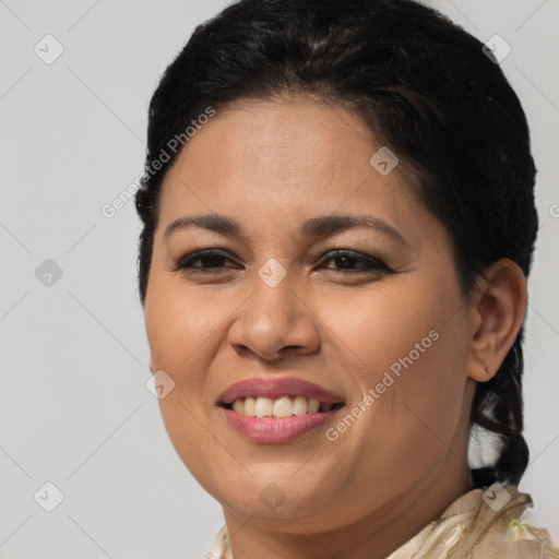 Joyful latino young-adult female with short  brown hair and brown eyes