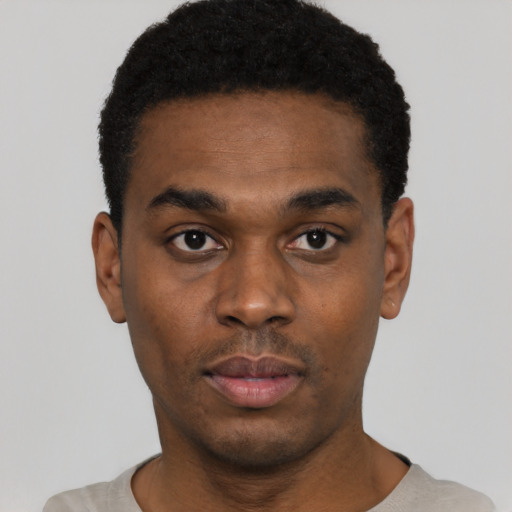 Neutral black young-adult male with short  black hair and brown eyes