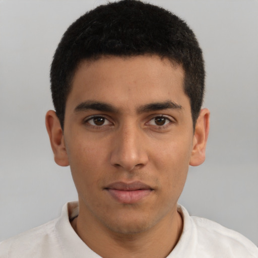 Neutral latino young-adult male with short  black hair and brown eyes