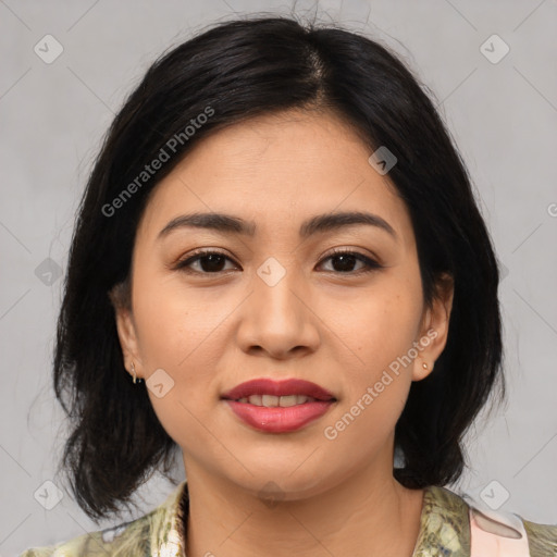 Joyful asian young-adult female with medium  brown hair and brown eyes