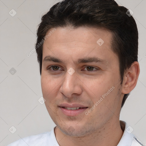 Joyful white young-adult male with short  brown hair and brown eyes