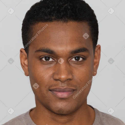 Joyful black young-adult male with short  brown hair and brown eyes