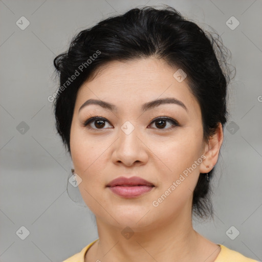 Joyful asian young-adult female with medium  brown hair and brown eyes