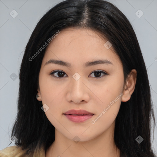 Joyful asian young-adult female with long  brown hair and brown eyes