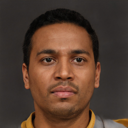 Neutral latino young-adult male with short  brown hair and brown eyes