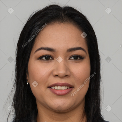 Joyful latino young-adult female with long  brown hair and brown eyes