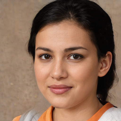 Joyful white young-adult female with medium  brown hair and brown eyes