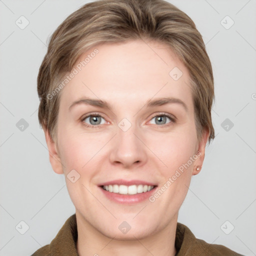 Joyful white young-adult female with short  brown hair and grey eyes