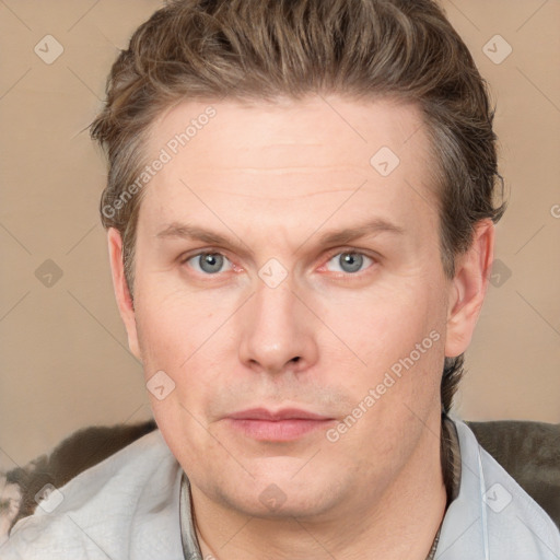 Joyful white adult male with short  brown hair and grey eyes