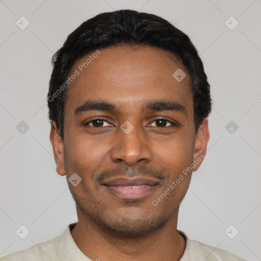 Joyful latino young-adult male with short  black hair and brown eyes
