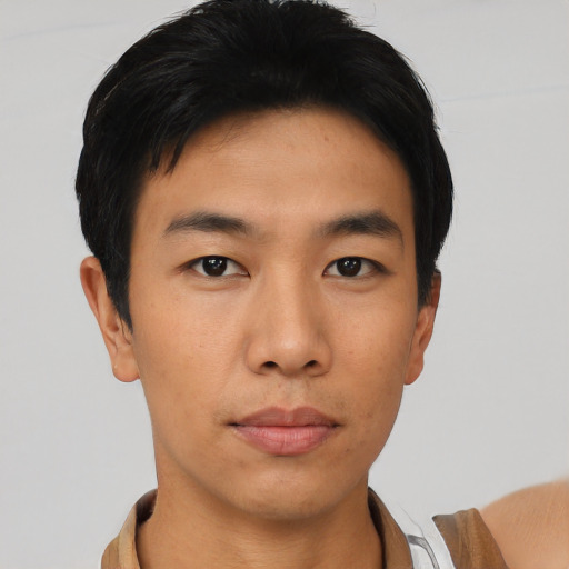 Neutral asian young-adult male with short  black hair and brown eyes