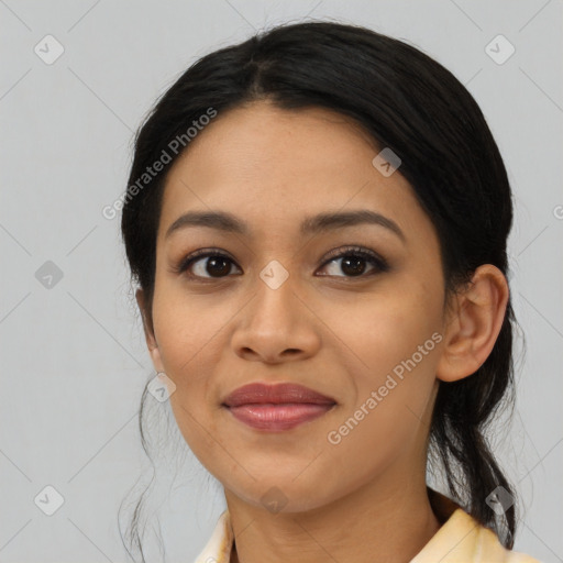 Joyful asian young-adult female with medium  black hair and brown eyes