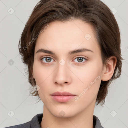 Neutral white young-adult female with medium  brown hair and brown eyes