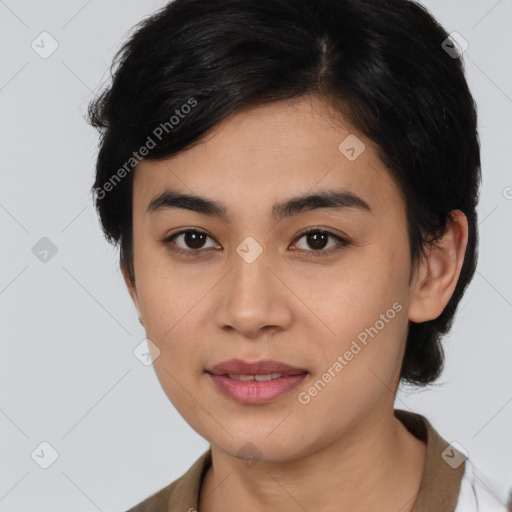 Joyful latino young-adult female with medium  brown hair and brown eyes