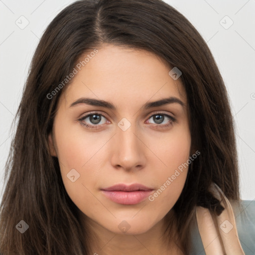 Neutral white young-adult female with long  brown hair and brown eyes