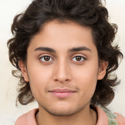 Joyful white young-adult male with medium  brown hair and brown eyes