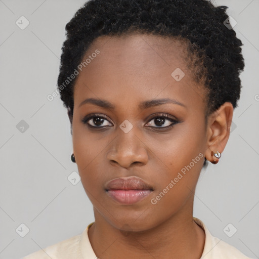 Neutral black young-adult female with short  brown hair and brown eyes