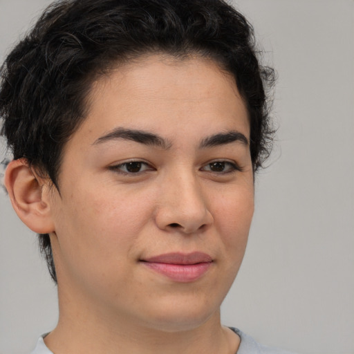 Joyful asian young-adult female with short  brown hair and brown eyes
