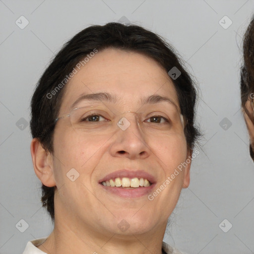 Joyful white adult female with short  brown hair and brown eyes