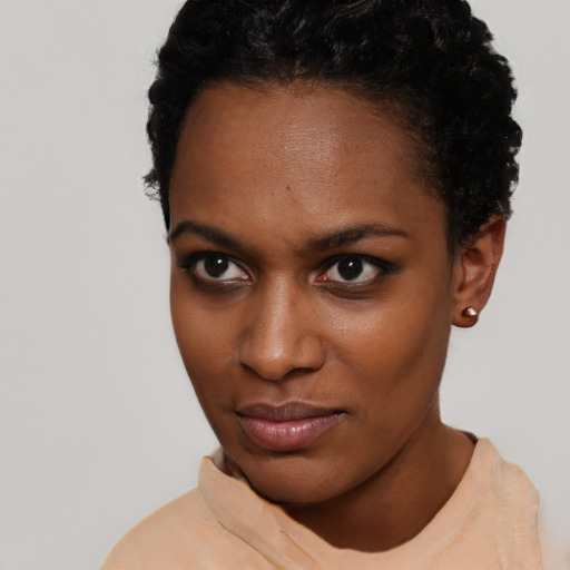 Neutral black young-adult female with short  brown hair and brown eyes