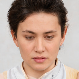 Neutral white young-adult female with short  brown hair and brown eyes