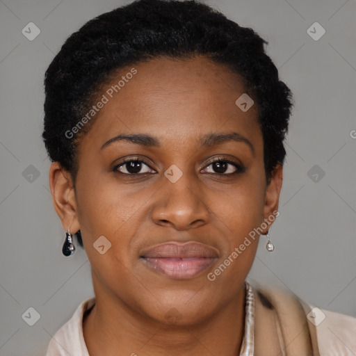 Joyful black young-adult female with short  brown hair and brown eyes