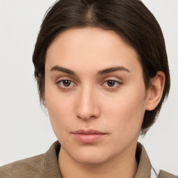 Neutral white young-adult female with short  brown hair and brown eyes