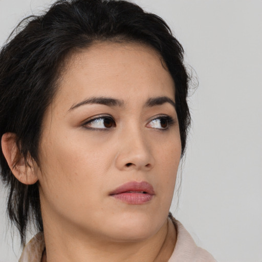 Neutral asian young-adult female with medium  brown hair and brown eyes