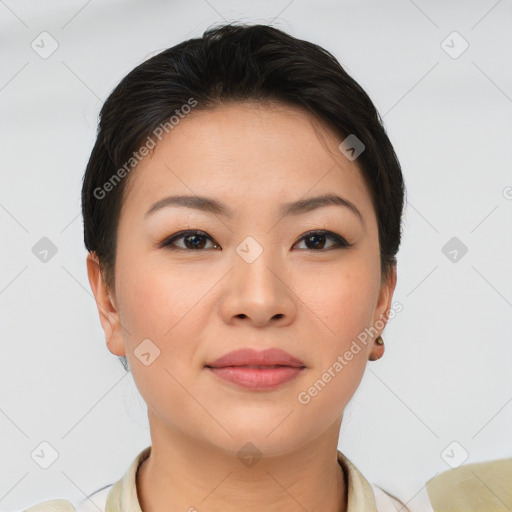 Joyful asian young-adult female with short  brown hair and brown eyes