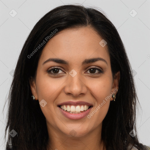 Joyful latino young-adult female with long  brown hair and brown eyes