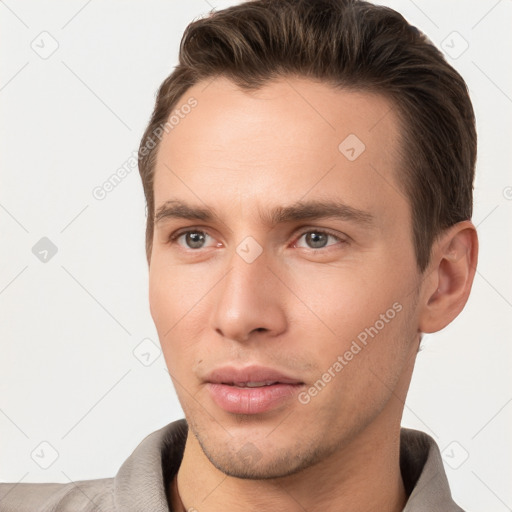 Neutral white young-adult male with short  brown hair and brown eyes