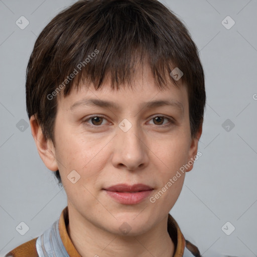 Joyful white young-adult female with short  brown hair and grey eyes