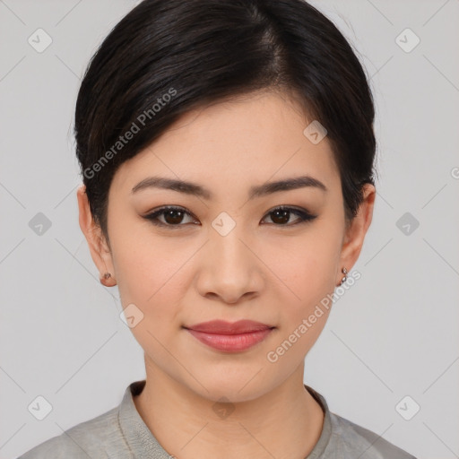 Joyful asian young-adult female with short  brown hair and brown eyes