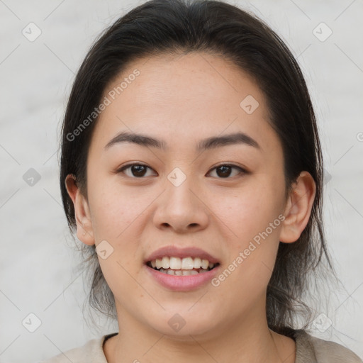 Joyful white young-adult female with medium  brown hair and brown eyes