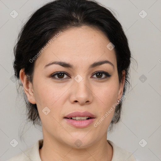 Joyful latino young-adult female with medium  brown hair and brown eyes