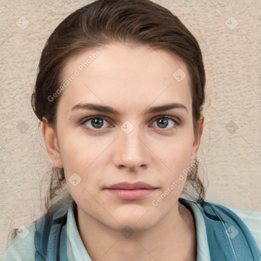 Neutral white young-adult female with short  brown hair and grey eyes